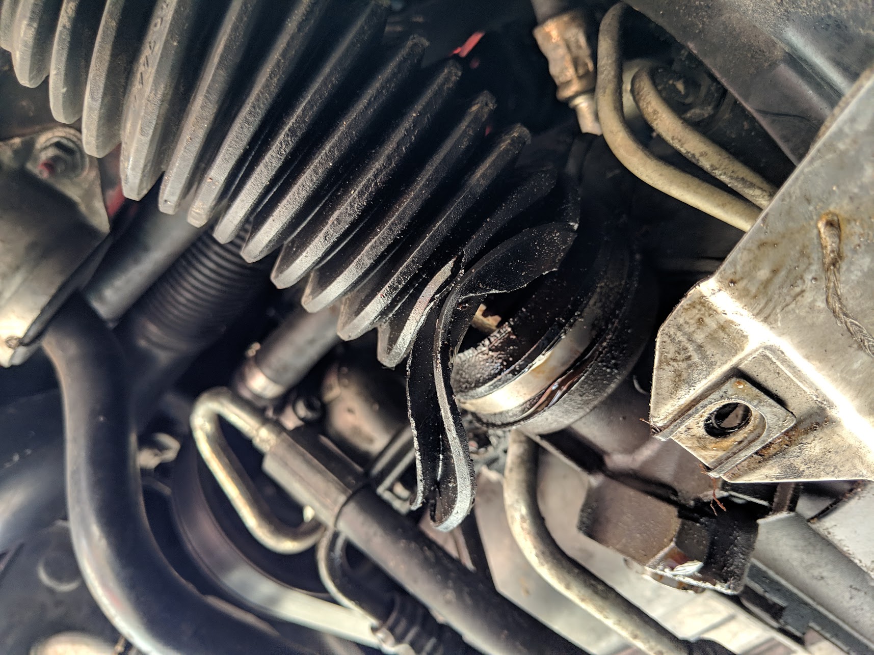 Name:  torn tie rod boots.jpg
Views: 1705
Size:  433.6 KB